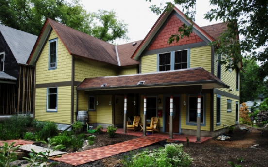 Modest 19th-century house lives larger but blends in, thanks to thoughtful makeover