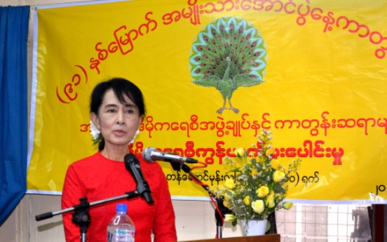 Myanmar's Suu Kyi to run in parliamentary polls