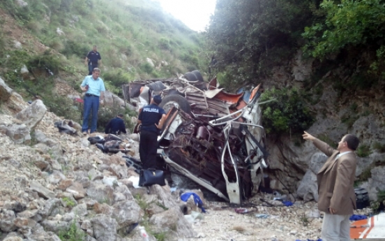 Bus with students falls off Albania cliff; 12 die