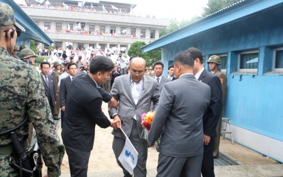 Investigators raid home, office of pro-North Korea activist