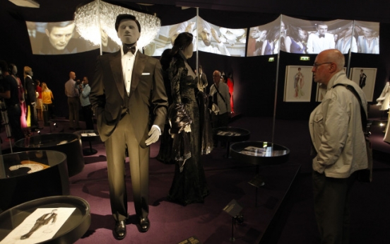 007 exhibition looks at screen spy as style icon