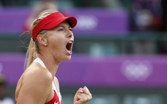 Sharapova sinks Clijsters to book all-Russian semi