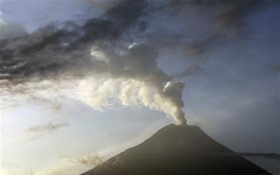 Ecuador volcano blasts more hot rock from crater
