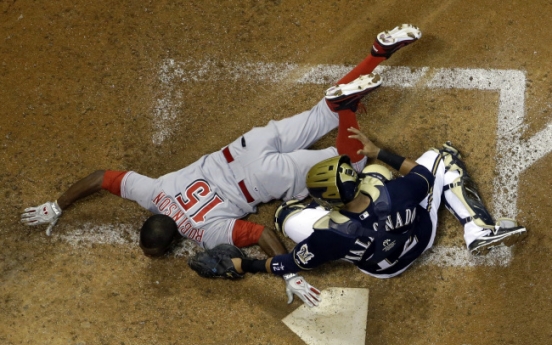 Brewers shut out Reds 2-0