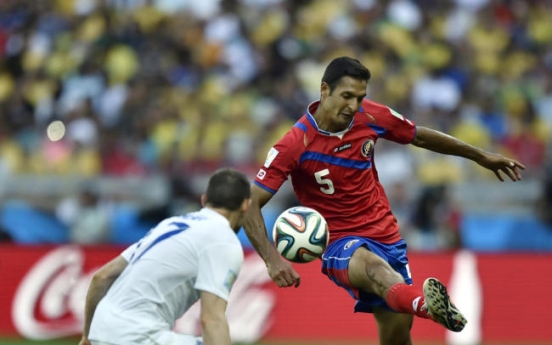 [World Cup] Costa Rica survives 'Group of Death' with ease