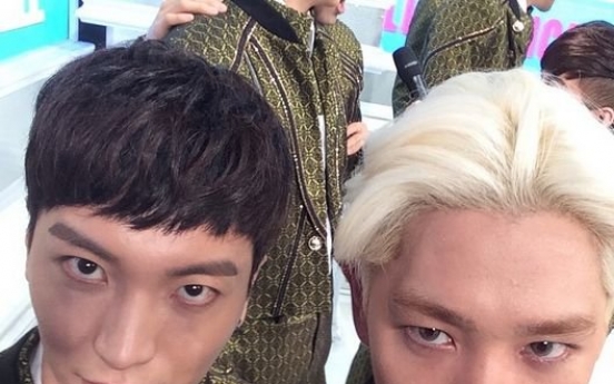 Super Junior’s Kangin and Leeteuk make sour faces