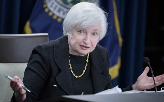 Federal Reserve holds rate at zero; cites China worries