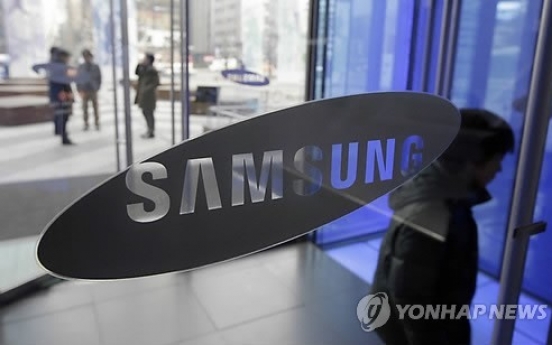 Samsung Q4 net tumbles on smartphone, chip woes