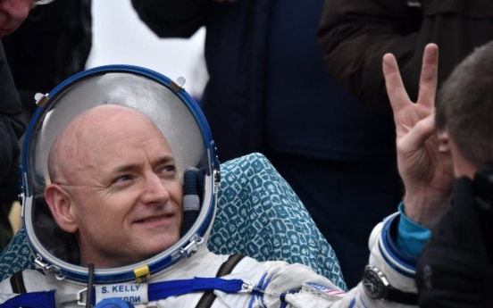 [Newsmaker] Spaceman back from record year flight