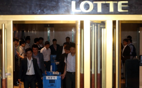 Lotte hires major law firms for defense as probe widens