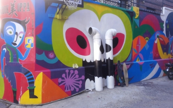 Expat artists team up to extend murals around Mi Cook Oppa