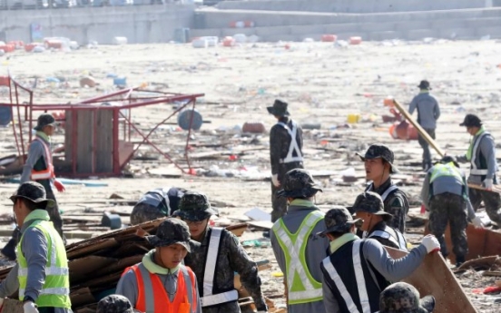 Typhoon death toll rises as restoration gets under way