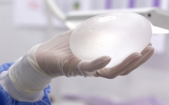 Safety of breast implants under review after silicone gel found in breast milk