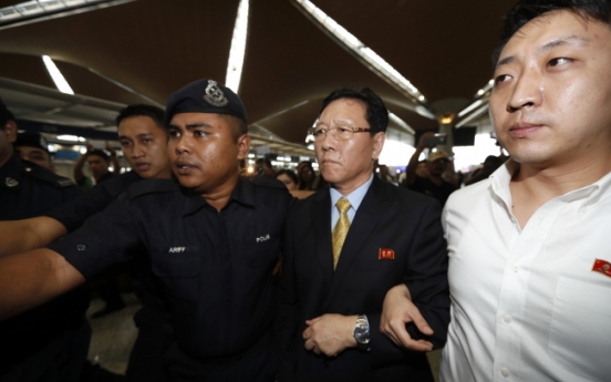 Expelled N. Korea envoy fires final salvo from airport