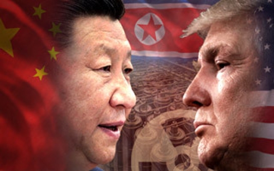 Trump discusses N. Korean threats in phone talks with Xi, Abe