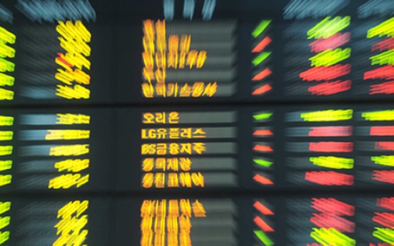 Seoul shares down in late morning on tech losses