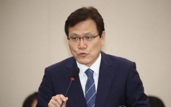 Top financial regulator calls for swift clearing of bad loans