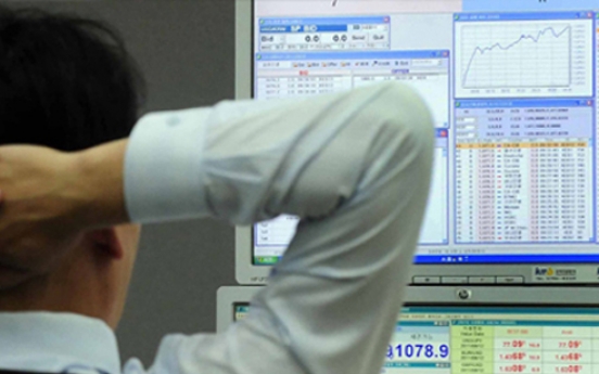Seoul shares trade lower late Monday morning