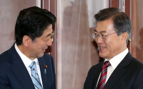 Moon, Abe vow to seek oil supply cut to punish N. Korea