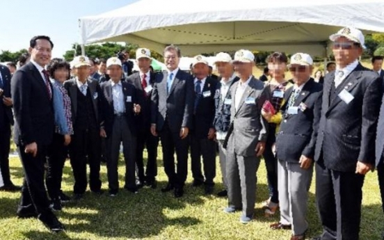 Korean president meets former POWs marking Armed Forces Day