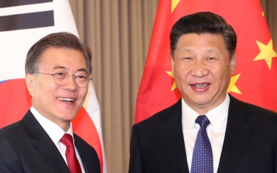 Seoul, Beijing to work on improving ties, hold summit in Vietnam