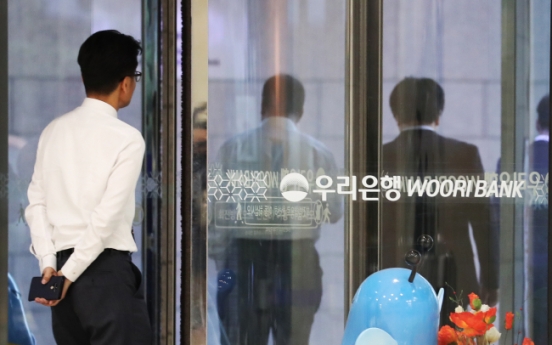 Woori Bank taps global biz group head as acting CEO
