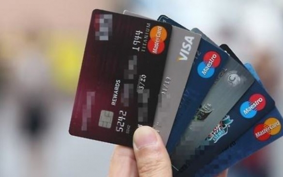 Card firms' Q3 profit tumbles 20% on fee cuts