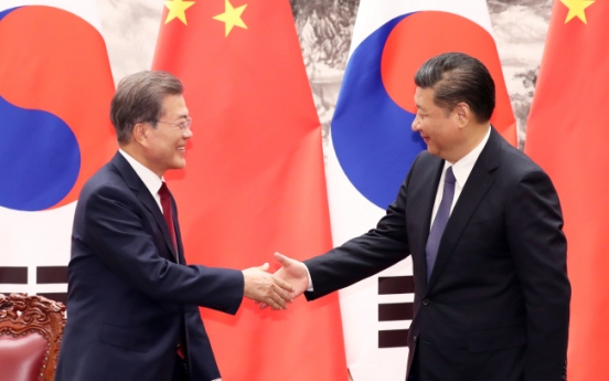 Moon, Xi vow no war on Korean Peninsula
