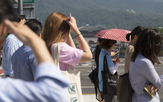 Toddler dies after being left alone in minibus in scorching heat in South Korea