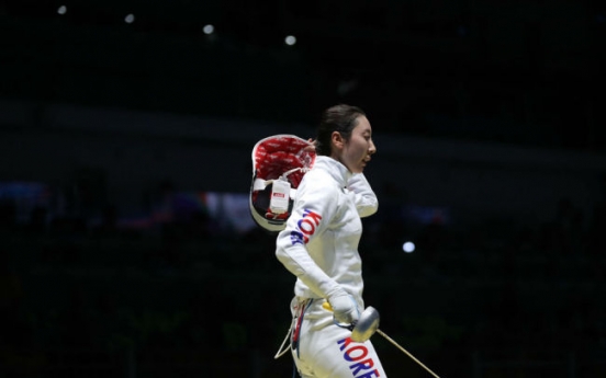 Star-crossed fencer finally puts Olympic controversy behind