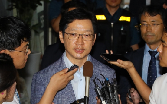 Gov. Kim heads home after overnight interrogation in opinion rigging probe