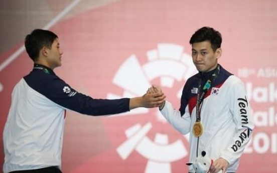 Korea picks up 3 gold medals in fencing, taekwondo