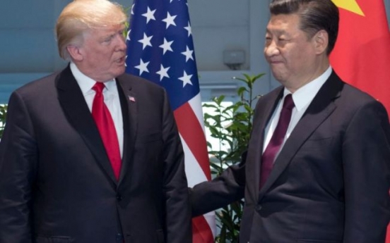 China announces tariff cut but no action on US complaints
