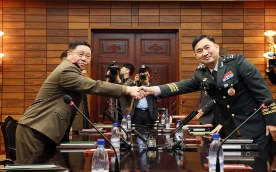 Koreas agree to verify removal of 22 guard posts next week