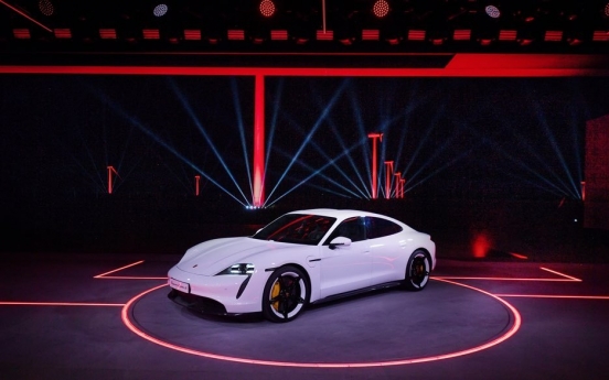 Porsche unveils first-ever electric sports car Taycan