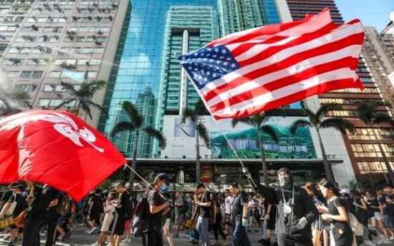 Trump signs law supporting Hong Kong protesters