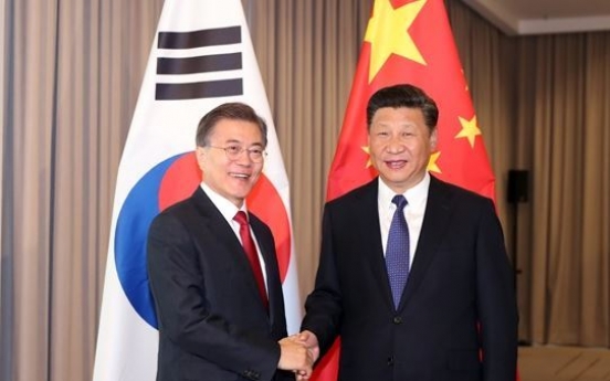 Moon to hold summit with Xi next week amid stalled NK nuke talks
