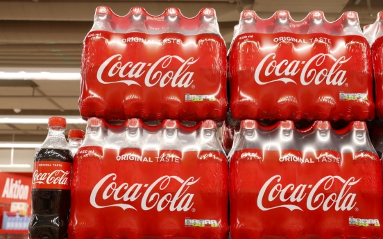 Coca-Cola hopeful COVID-19 vaccines will reverse profit slide