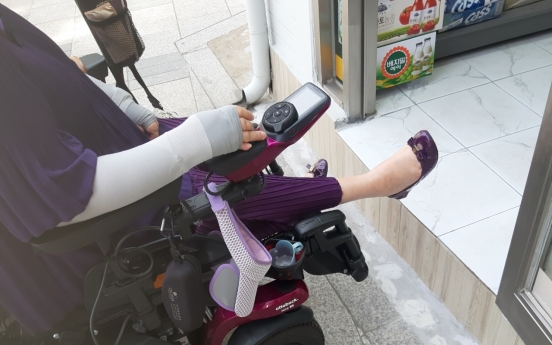 [Feature] Wheelchair woes still blight Seoul