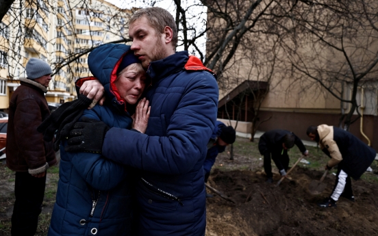 [Newsmaker] In Bucha, Ukraine, burned, piled bodies among latest horrors