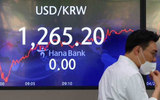 Seoul shares open slightly higher amid Fed rate hike woes