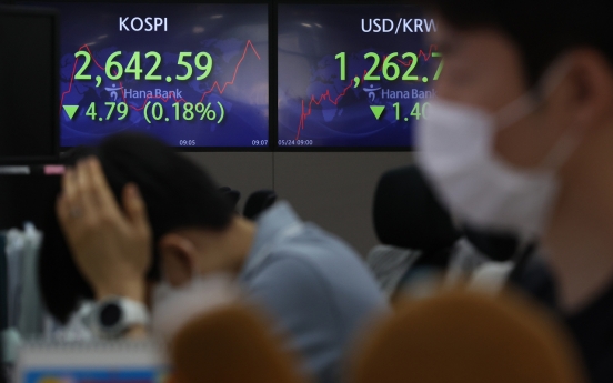 Seoul shares open lower ahead of Fed minutes release