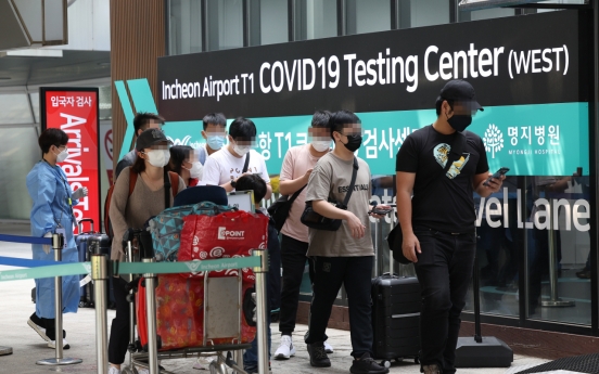 S. Korea's new COVID-19 cases around 26,300 with omicron in retreat