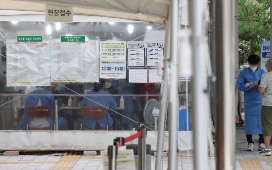 S. Korea's new <b>COVID-19</b> cases hit around 35,000 amid rising reinfections