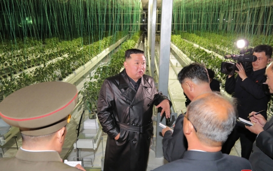 NK leader attends greenhouse farm opening ceremony on key party anniv.