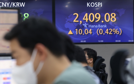 Seoul shares open tad higher ahead of US midterm election results