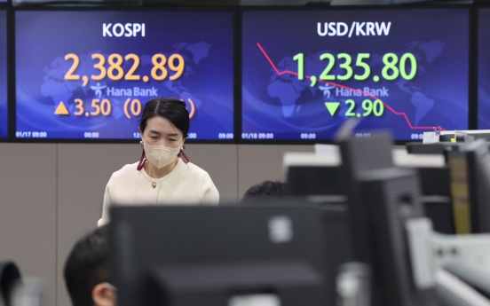 Seoul shares open lower amid earnings concerns
