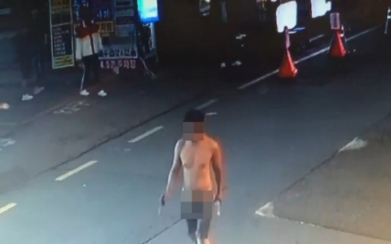 Man nabbed in naked rampage