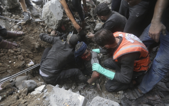 Following an Israeli airstrike, crowded Gaza hospital struggles to treat wounded children