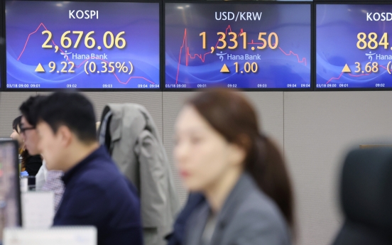 Seoul shares open slightly higher on tech gains